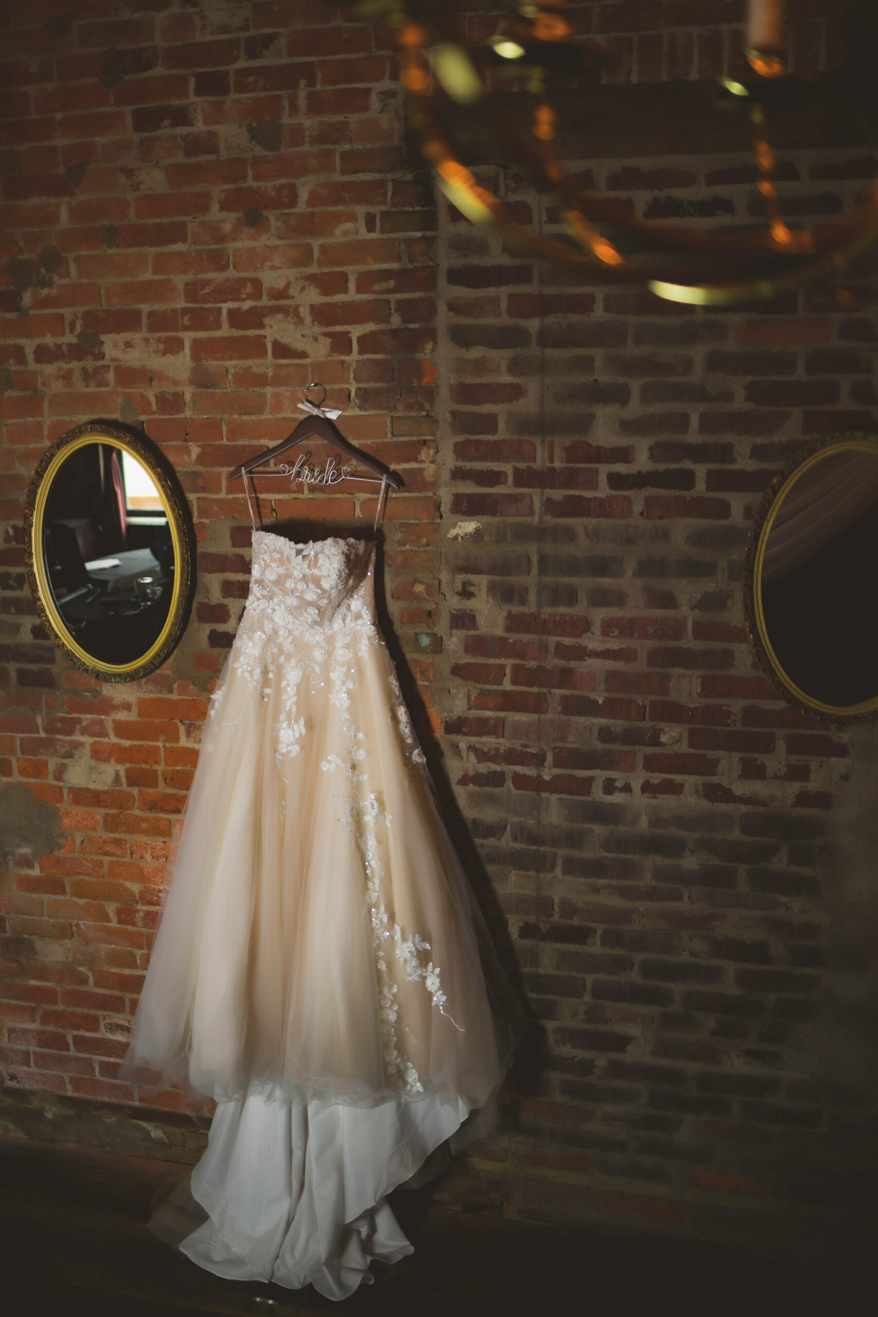 Geraldine's Supper Club & Lounge wedding venue gown hanging details
